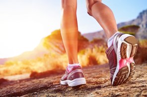 sunrise and legs with sport shoes image