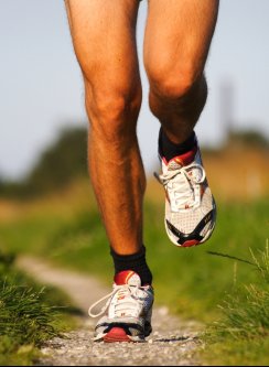 man is running with shoes